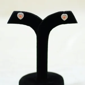 Pair of blush heart halo 925 silver stud earrings on black display stand