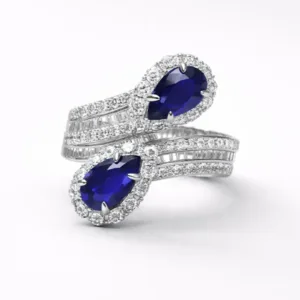 925 silver adjustable ring with twin blue teardrop accents and sparkling halo design