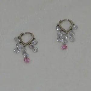 Pair of pink cascade silver drop earrings on white surface
