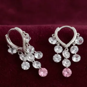 Pair of pink cascade 925 silver drop earrings on burgundy fabric