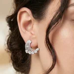 Radiant crescent 925 silver statement earring worn on ear